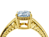 Yellow gold Fancy Blue Oval Cut Diamond Ring with Milgrain Pavé Band and Four-Prong Setting_24