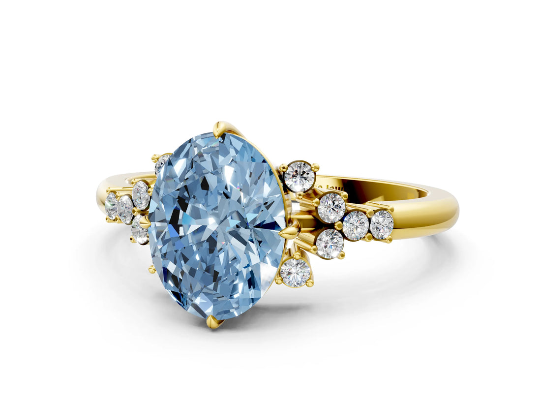 Yellow gold Fancy Blue Oval Cut Diamond Ring with Side Stones and Four-Prong Setting_12