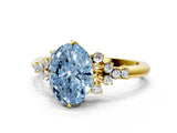 Yellow gold Fancy Blue Oval Cut Diamond Ring with Side Stones and Four-Prong Setting_148