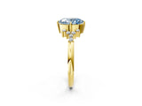 Yellow gold Fancy Blue Oval Cut Diamond Ring with Side Stones and Four-Prong Setting_150
