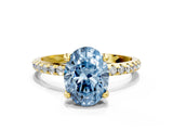 Yellow gold Fancy Blue Oval Cut Diamond Solitaire Ring with Four-Prong Setting and Pavé Band_3