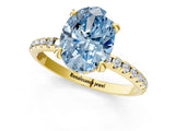 Yellow gold Fancy Blue Oval Cut Diamond Solitaire Ring with Four-Prong Setting and Pavé Band_4