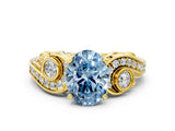 Yellow gold Fancy Blue Oval Cut Diamond Solitaire Ring with Milgrain Pavé Band and Four-Prong Setting_155