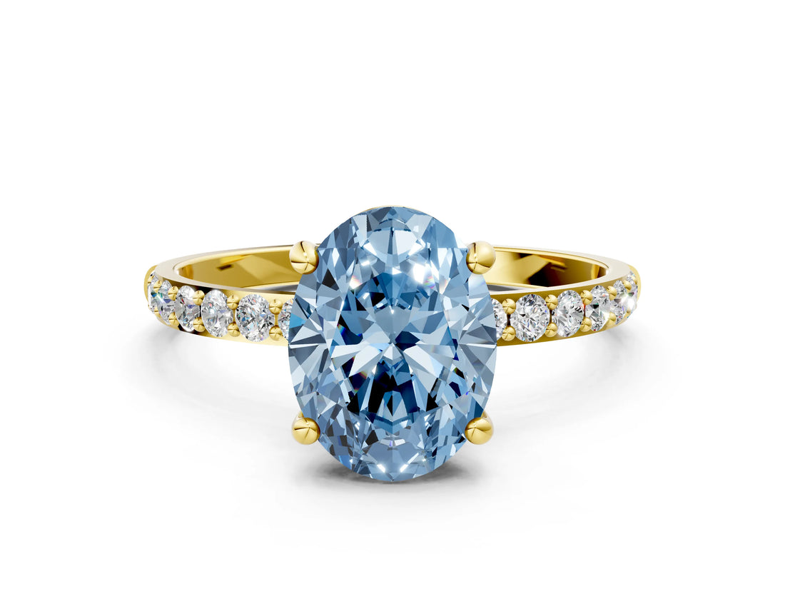 Yellow gold Fancy Blue Oval Cut Diamond Solitaire Ring with Pave Band and Four Prong Setting_86