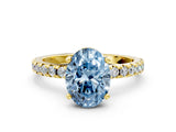 Yellow gold Fancy Blue Oval Cut Diamond Solitaire Ring with Round  Pavé Band and Four-Prong Setting_36
