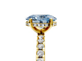 Yellow gold Fancy Blue Oval Cut Diamond Solitaire Ring with Round  Pavé Band and Four-Prong Setting_41