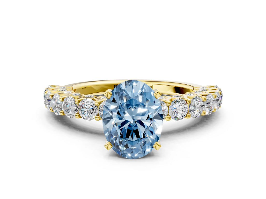 Yellow gold Fancy Blue Oval Cut Diamond Solitaire Ring with Shared Prong Pavé Band and Four-Prong Setting_57
