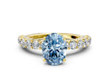 Yellow gold Fancy Blue Oval Cut Diamond Solitaire Ring with Shared Prong Pavé Band and Four-Prong Setting_57
