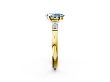 Yellow gold Fancy Blue Oval  Cut Diamond Solitaire Ring with Tapered Baguette Accents and Four-Prong Setting_90