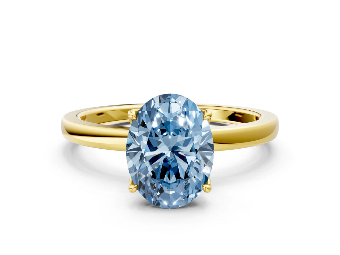 Yellow gold Fancy Blue Oval Cut Diamond Solitaire Ring with Thin Band and Prong Setting_12