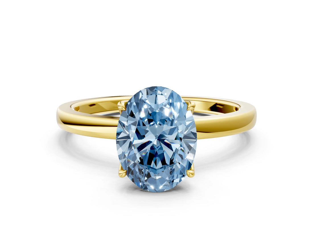 Yellow gold Fancy Blue Oval Cut Diamond Solitaire Ring with Thin Band and Prong Setting_24