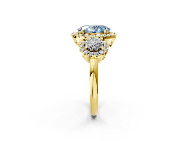 Yellow gold Fancy Blue Oval Cut Diamond Three-Stone Halo Ring with Prong Setting and Pavé Accents