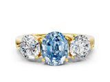 Yellow gold Fancy Blue Oval Cut Diamond Three-Stone Ring with Prong Setting and Classic Band_105