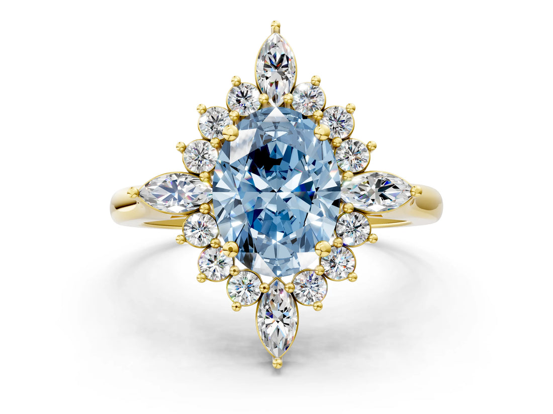 Yellow gold Fancy Blue Oval Cut Halo Diamond Cluster Ring with Marquise and Round Stones on a White Gold Band with Prong Setting