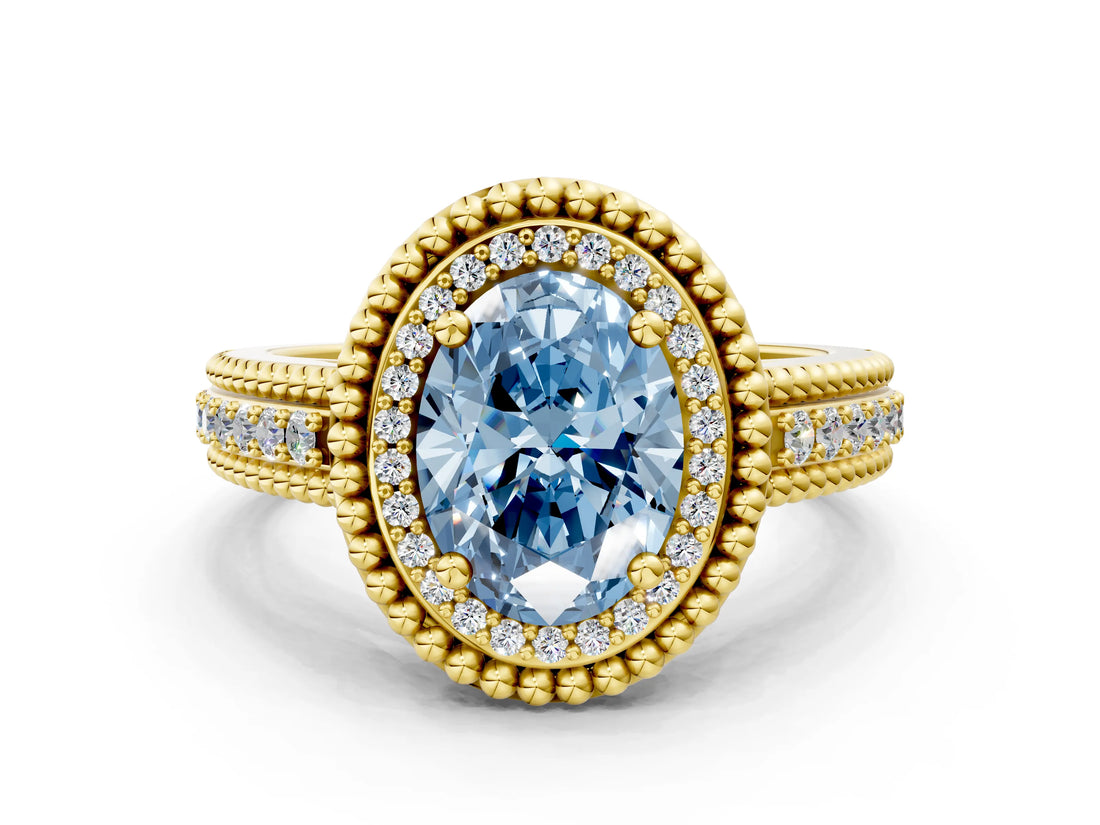 Yellow gold Fancy Blue Oval Cut Halo Diamond Ring with Beaded Split Shank and Four-Prong Setting