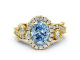 Yellow gold Fancy Blue Oval Cut Halo Diamond Ring with Milgrain and Bezel Accents on a Split Shank Band_12