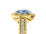 Yellow gold Fancy Blue Oval  Cut Halo Diamond Ring with Pavé Band and Four-Prong Setting_63