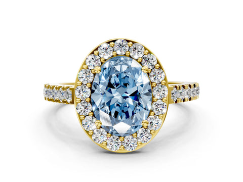 Yellow gold Fancy Blue Oval Cut Halo Diamond Ring with Pavé Band and Three-Prong Setting
