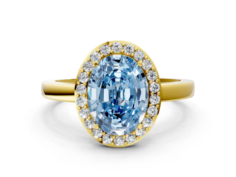 Yellow gold Fancy Blue Oval Cut Halo Diamond Ring with Solitaire Band and Prong Setting