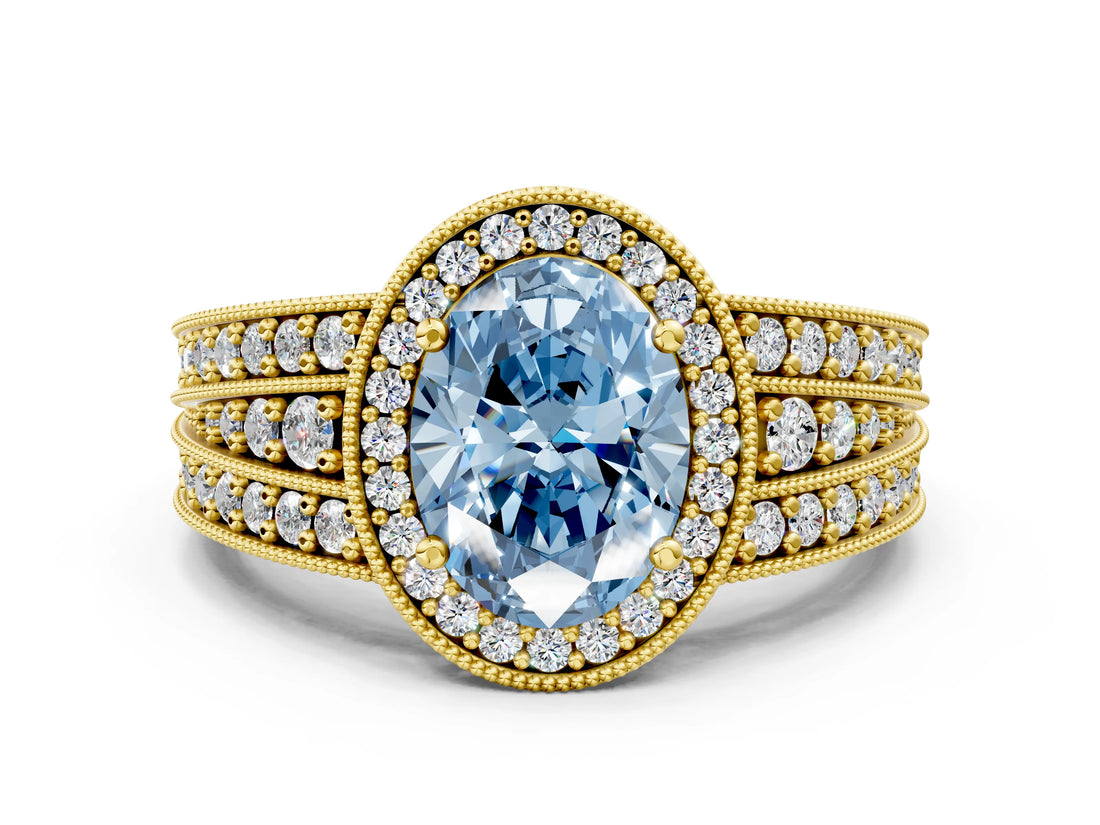 Yellow gold Fancy Blue Oval Cut Halo Diamond Split Shank Ring with Prong Setting