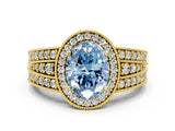 Yellow gold Fancy Blue Oval Cut Halo Diamond Split Shank Ring with Prong Setting