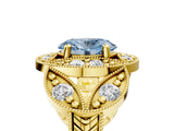 Yellow gold Fancy Blue Oval Cut Halo Milgrain Diamond Engagement Ring with Leaf Band and Four-Prong Setting_5