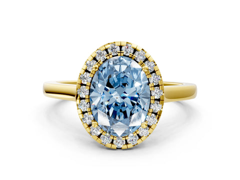 Yellow gold Fancy Blue Oval Cut Halo Round Diamond Solitaire Ring with Pavé Band and Four-Prong Setting