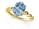 Yellow gold Fancy Blue Oval Cut Solitaire Diamond Ring with Infinity Twist Band and Four-Prong Setting_1