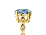 Yellow gold Fancy Blue Oval Cut Solitaire Diamond Ring with Infinity Twist Band and Four-Prong Setting_5