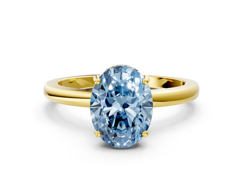 Yellow gold Fancy Blue Oval Cut Solitaire Diamond Ring with Prong Setting and Plain Band