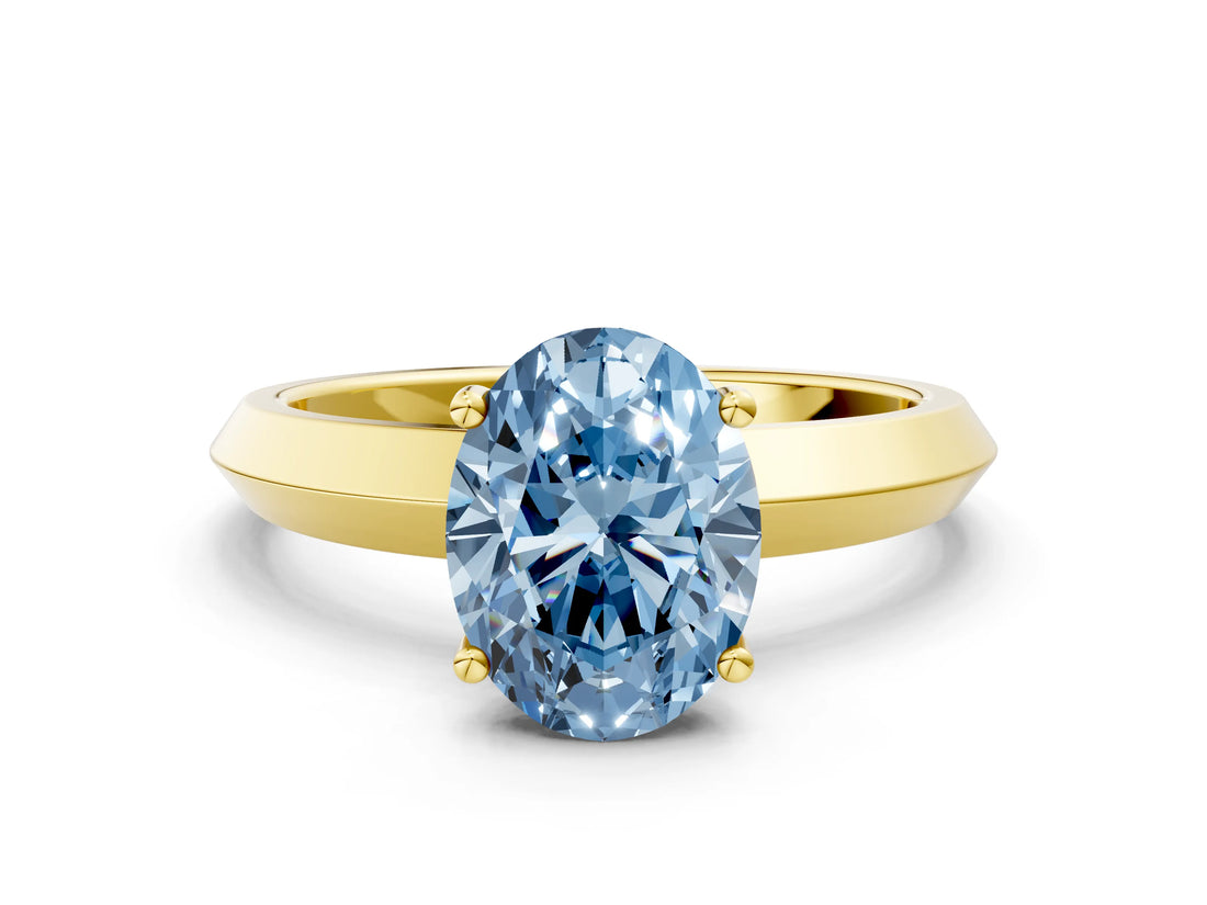 Yellow gold Fancy Blue Oval  Cut Solitaire Engagement Ring with Flat Band and Four-Prong Setting