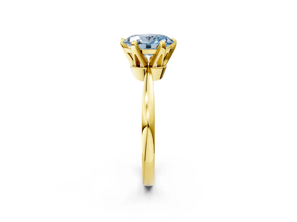 Yellow gold Fancy Blue Oval Cut Solitaire Engagement Ring with Six-Prong Setting and Tapered Band