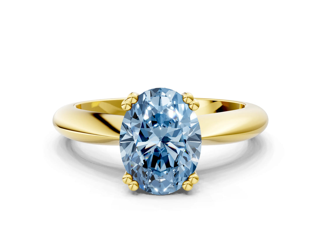 Yellow gold Fancy Blue Oval  Cut Solitaire Engagement Ring with Tapered Band and Four-Prong Setting 1