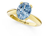 Yellow gold Fancy Blue Oval  Cut Solitaire Engagement Ring with Tapered Band and Four-Prong Setting 2