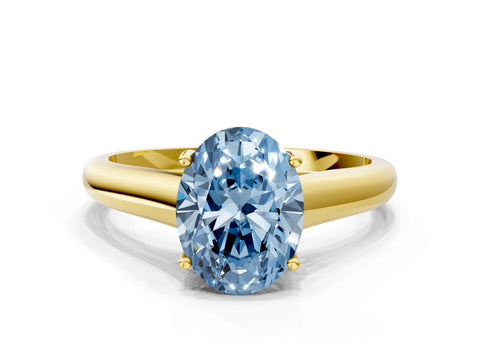 Yellow gold Fancy Blue Oval Cut Solitaire Engagement Ring with Tapered Band and Four-Prong Setting_3