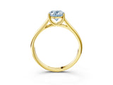 Yellow gold Fancy Blue Oval Cut Solitaire Engagement Ring with Tapered Band and Four-Prong Setting_6