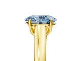 Yellow gold Fancy Blue Oval Cut Solitaire Engagement Ring with Tapered Band and Four-Prong Setting_8