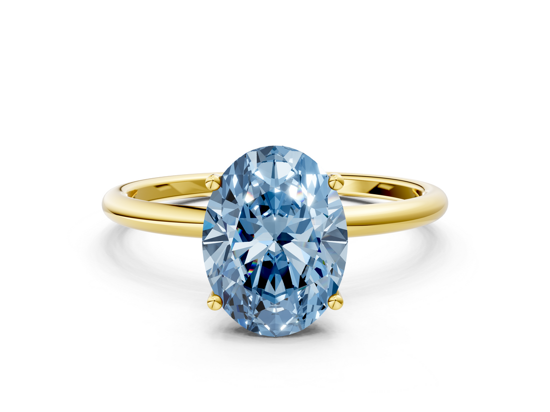 Yellow gold Fancy Blue Oval  Cut Solitaire Engagement Ring with Thin Band and Four-Prong Setting_3