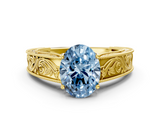 Yellow gold Fancy Blue Oval  Cut Solitaire Engraved Band with Four-Prong Setting_62