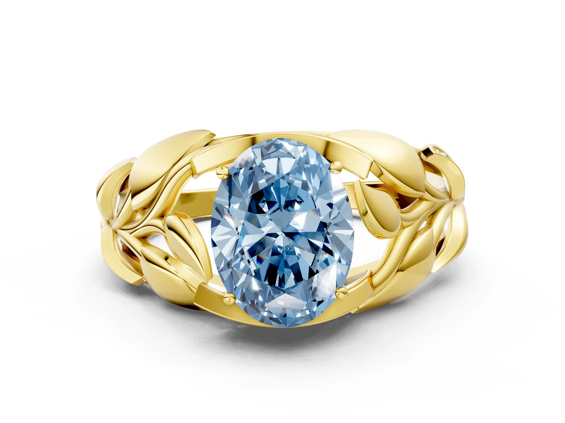 Yellow gold Fancy Blue Oval Cut Solitaire Leaf-Inspired Engagement Ring with Prong Setting_12