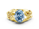 Yellow gold Fancy Blue Oval Cut Solitaire Leaf-Inspired Engagement Ring with Prong Setting_12