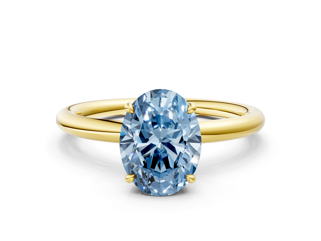 Yellow gold Fancy Blue Oval  Cut Solitaire Ring with Thin Band and Four-Prong Setting_16