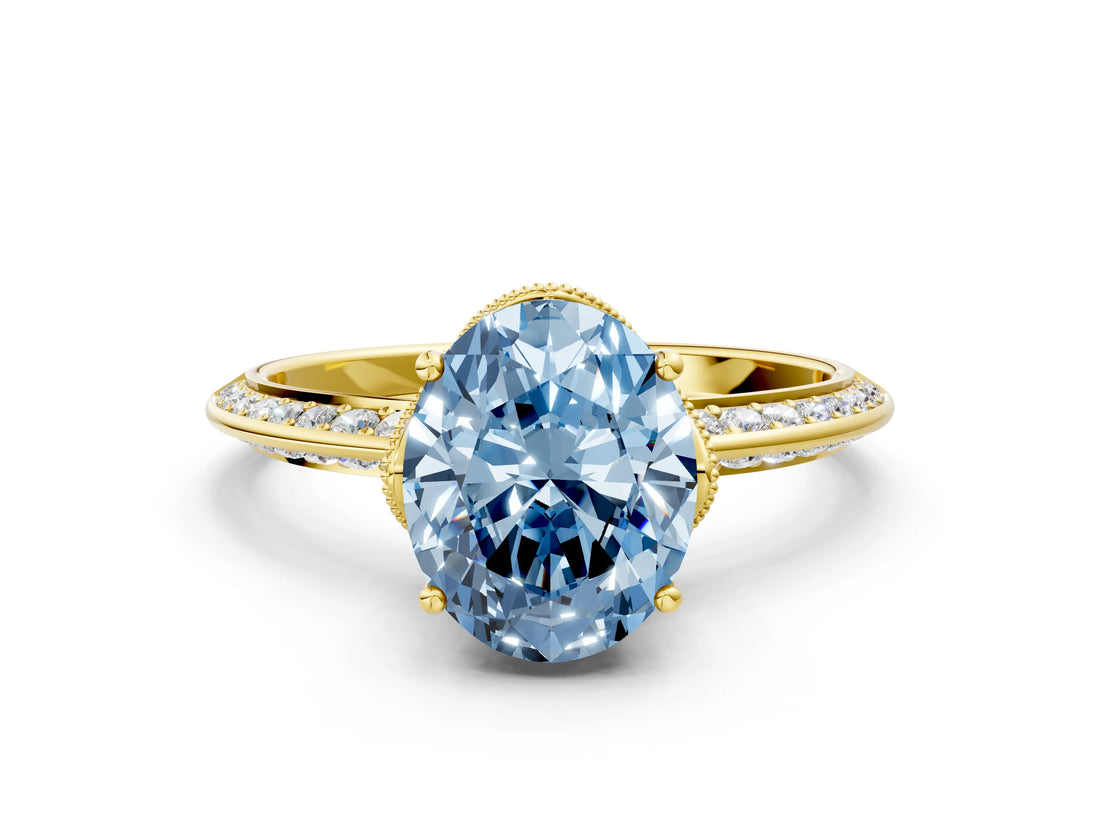 Yellow gold Fancy Blue Oval Cut Solitaire Split Shank Pave Diamond Engagement Ring with Four-Prong Setting_24