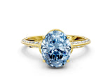 Yellow gold Fancy Blue Oval Cut Solitaire Split Shank Pave Diamond Engagement Ring with Four-Prong Setting_24