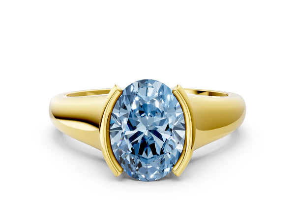Yellow gold Fancy Blue Oval Cut Solitaire Tension Set Diamond Ring with Split Shank Band