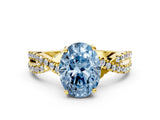 Yellow gold Fancy Blue Oval Cut Solitaire Twist Pave Diamond Engagement Ring with Prong Setting