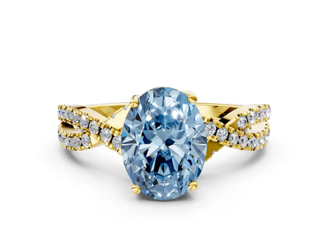 Yellow gold Fancy Blue Oval Cut Solitaire Twist Pave Diamond Engagement Ring with Prong Setting