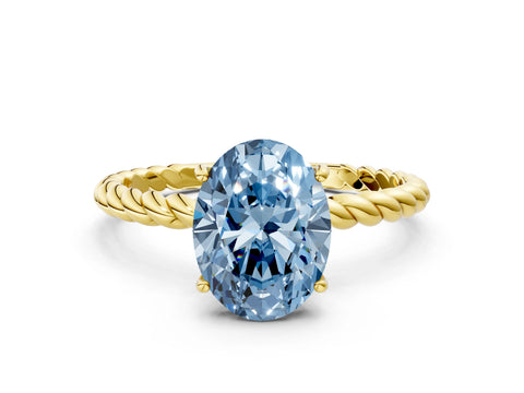 Yellow gold Fancy Blue Oval Cut Solitaire Twisted Band 4-Prong Ring
