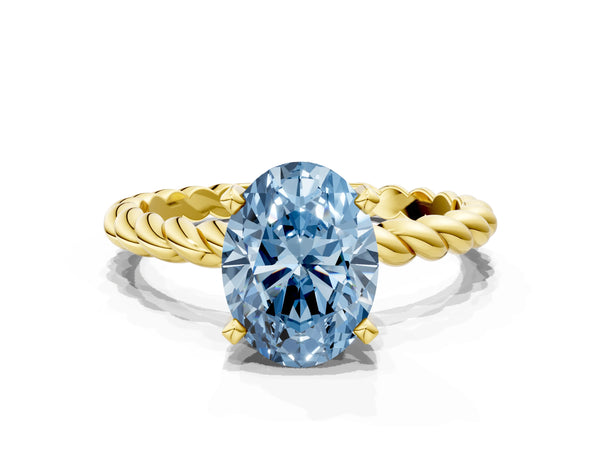 Yellow gold Fancy Blue Oval  Cut Solitaire Twisted Band with Four-Prong Setting