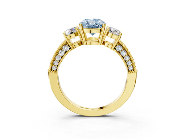 Yellow gold Fancy Blue Oval Cut Three-Stone Diamond Ring with Pavé Band and Four-Prong Setting